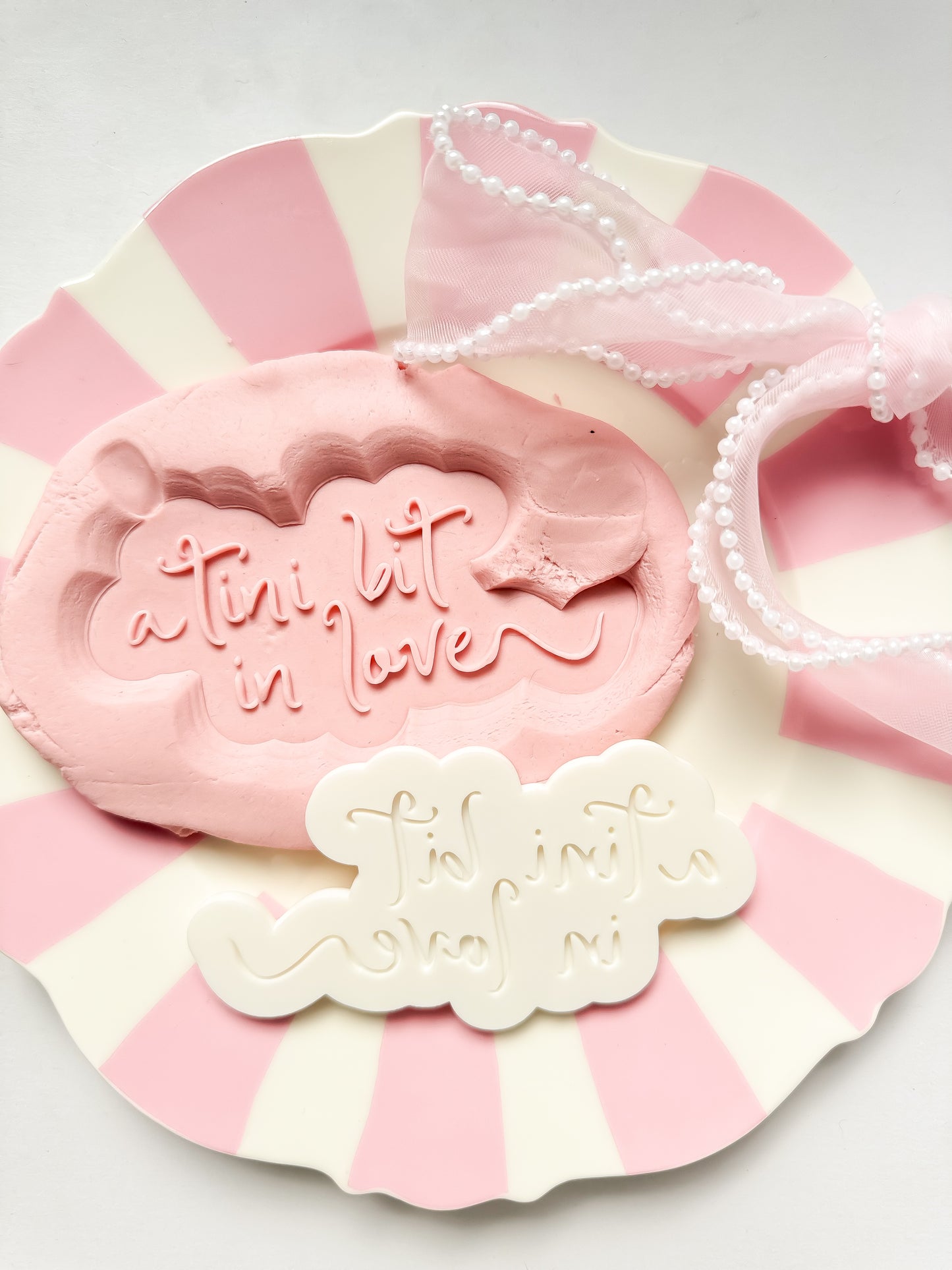 A tini bit in love - Debosser and Cutter