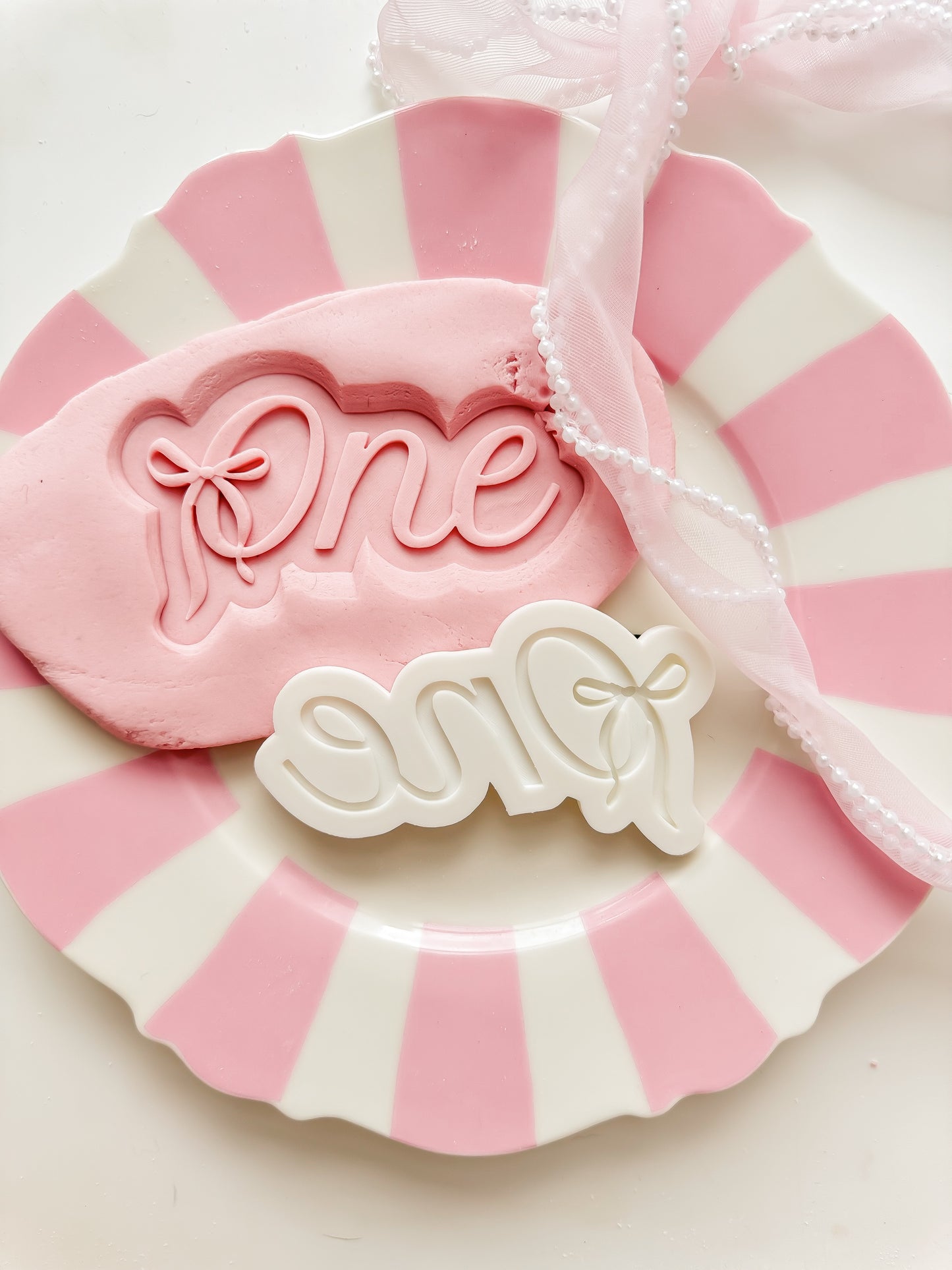 One bow number - Debosser and Cutter