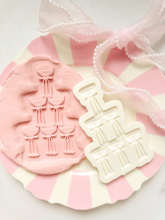Champagne tower with bows - Debosser and Cutter