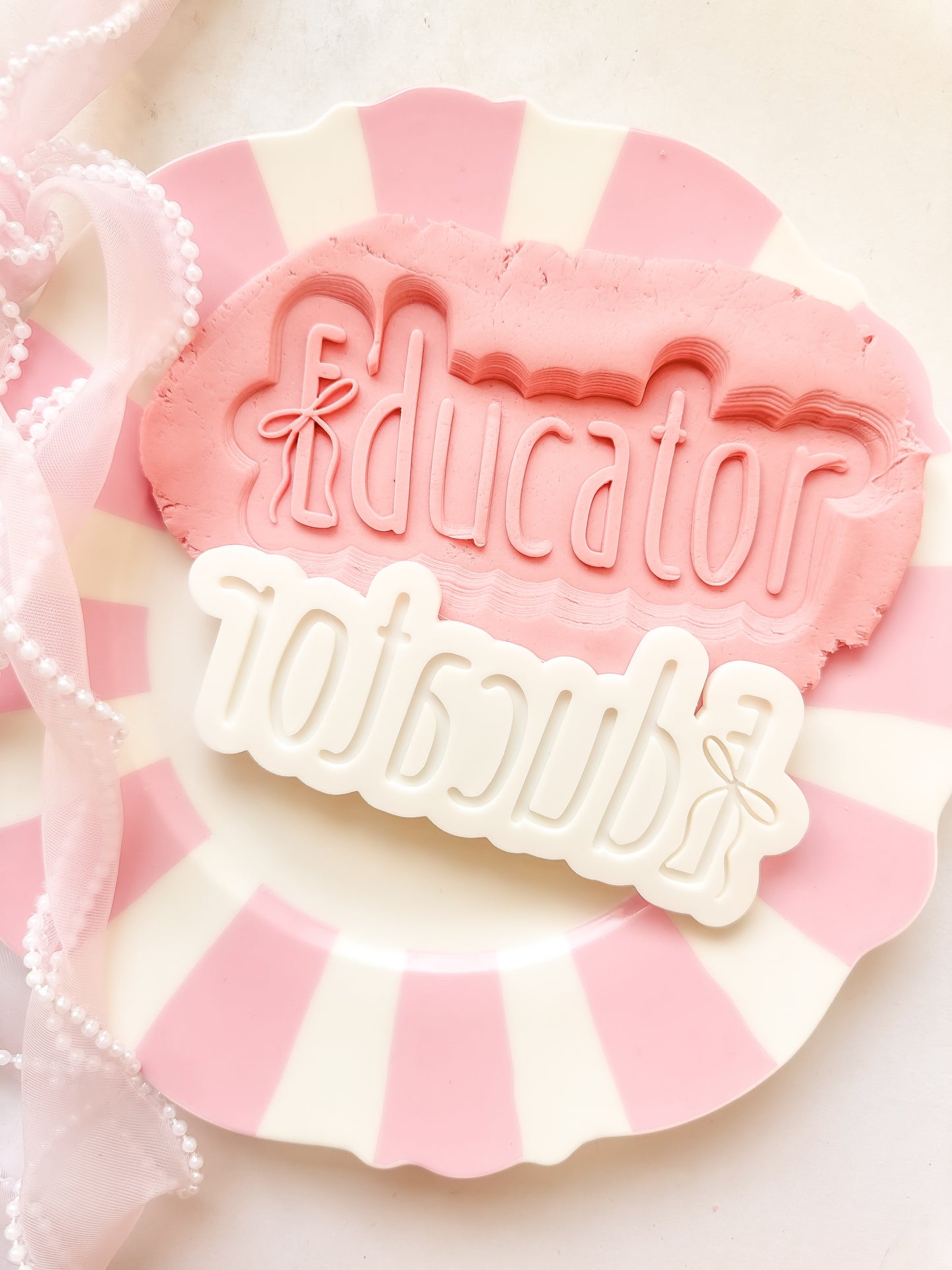 Educator with bow - Debosser and Cutter